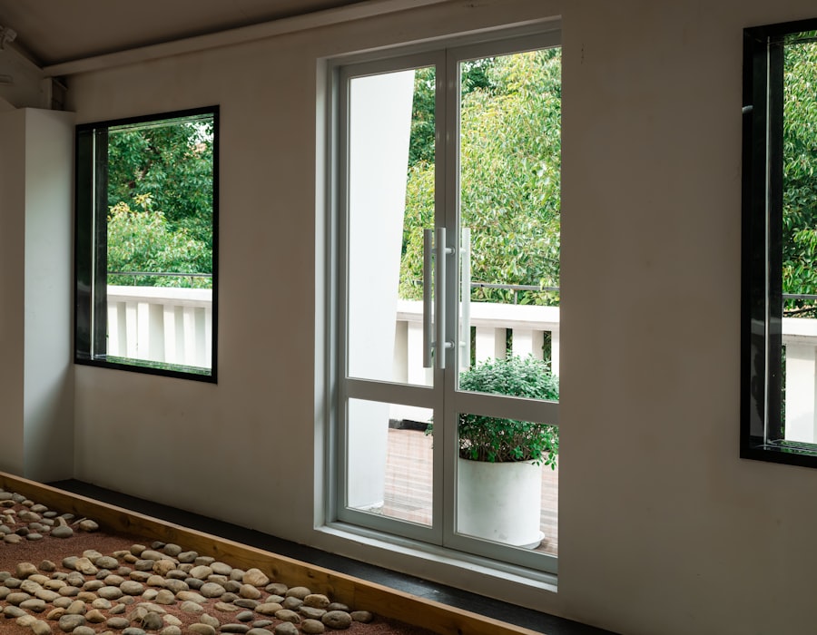 Slim dark aluminium framed windows in a modern room