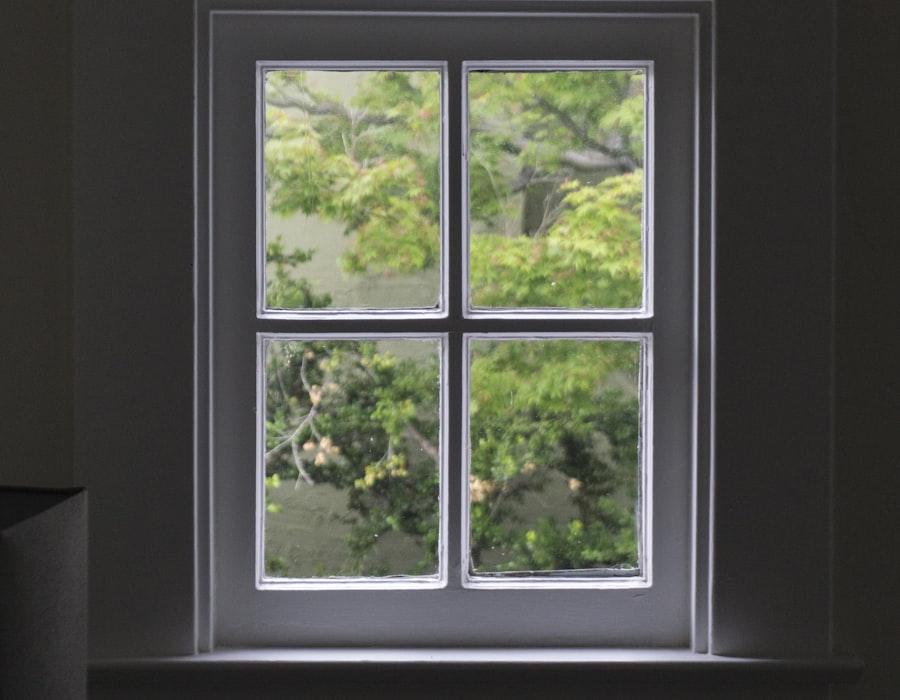 White uPVC casement window looking out over a garden